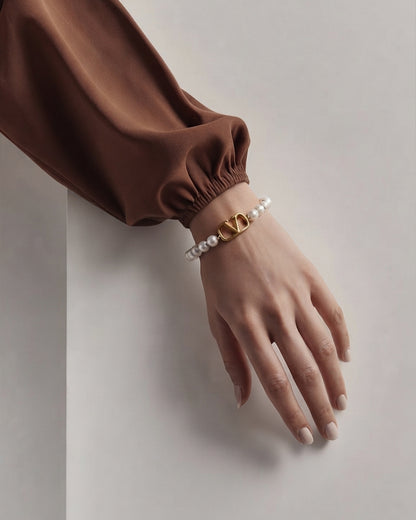This is a Valentino Garavani VLogo Signature Pearl Bracelet