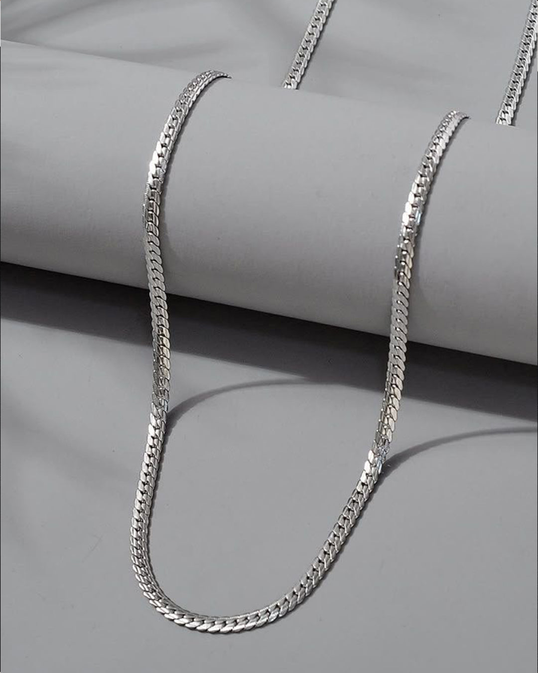 Silver curb chain and braided cable silver bracelet