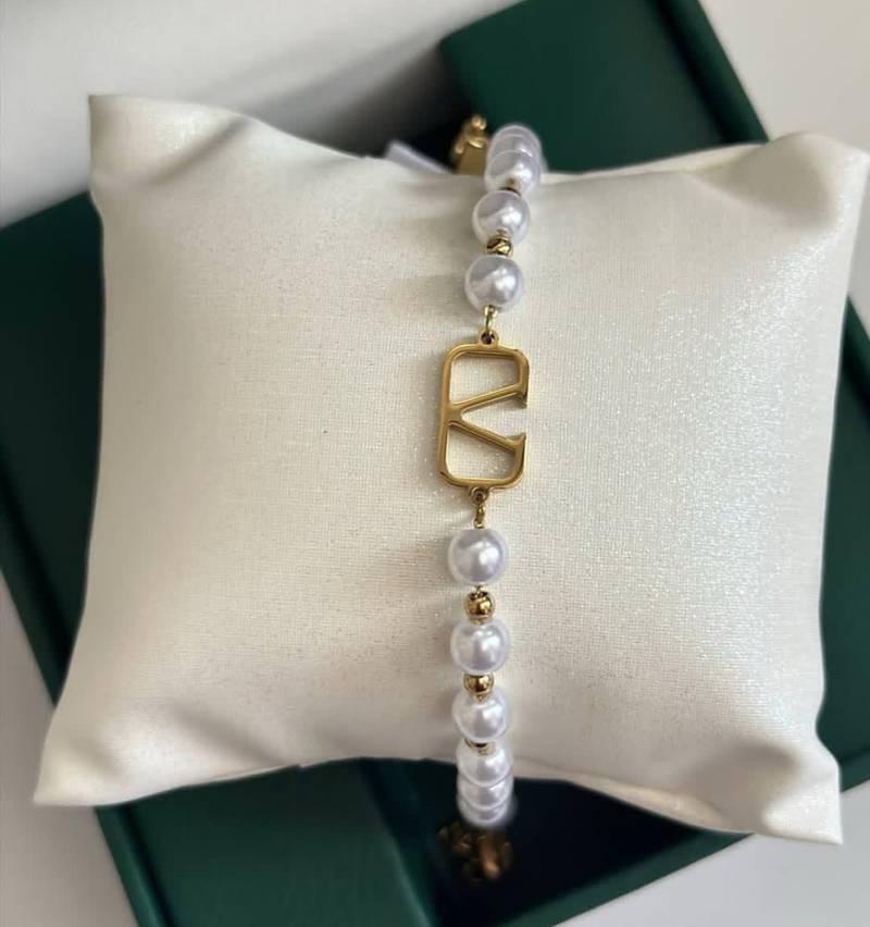 This is a Valentino Garavani VLogo Signature Pearl Bracelet