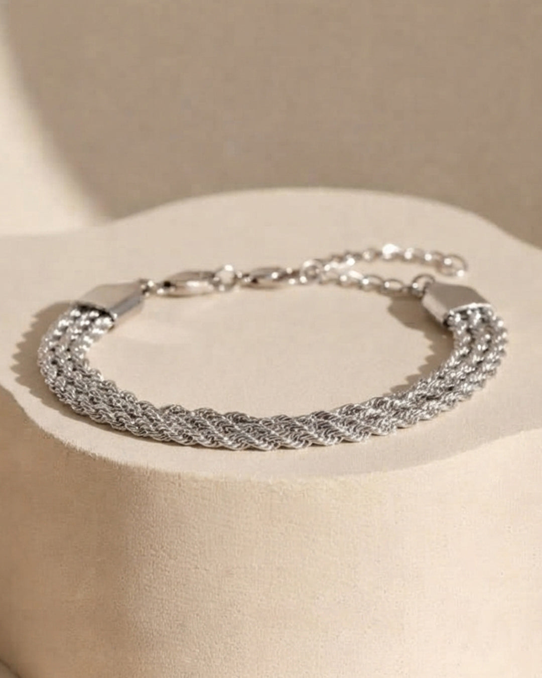 Silver curb chain and braided cable silver bracelet