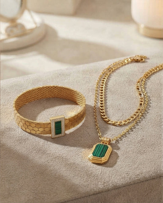 Gold mesh cuff bangle with layered gold chain necklace