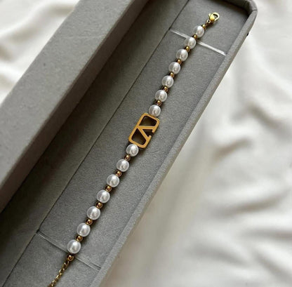 This is a Valentino Garavani VLogo Signature Pearl Bracelet